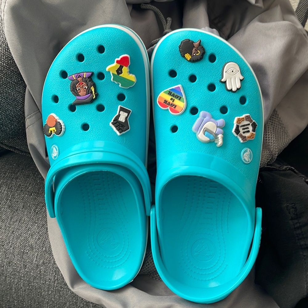 Aqua blue crocs. Never worn. Charms NOT included 🙂